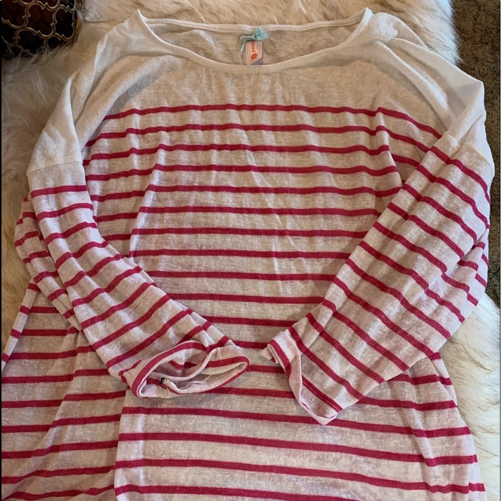 SOLD.  Sheer top